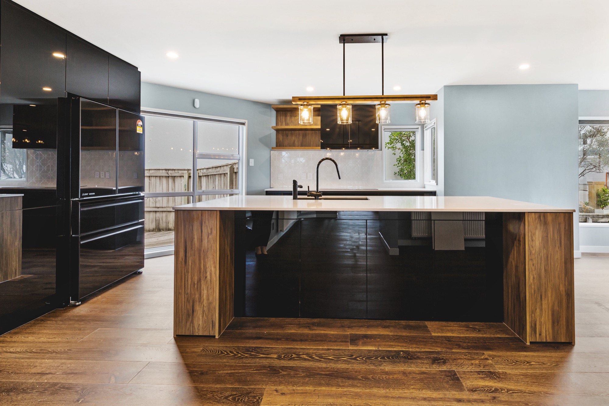 Kitchen with waterfall kitchen island
